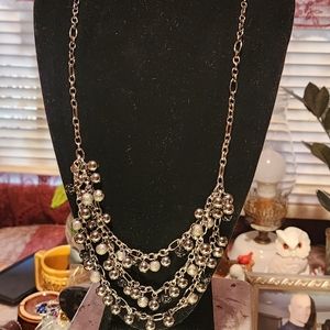 Chain with three layers of beaded chains necklace.